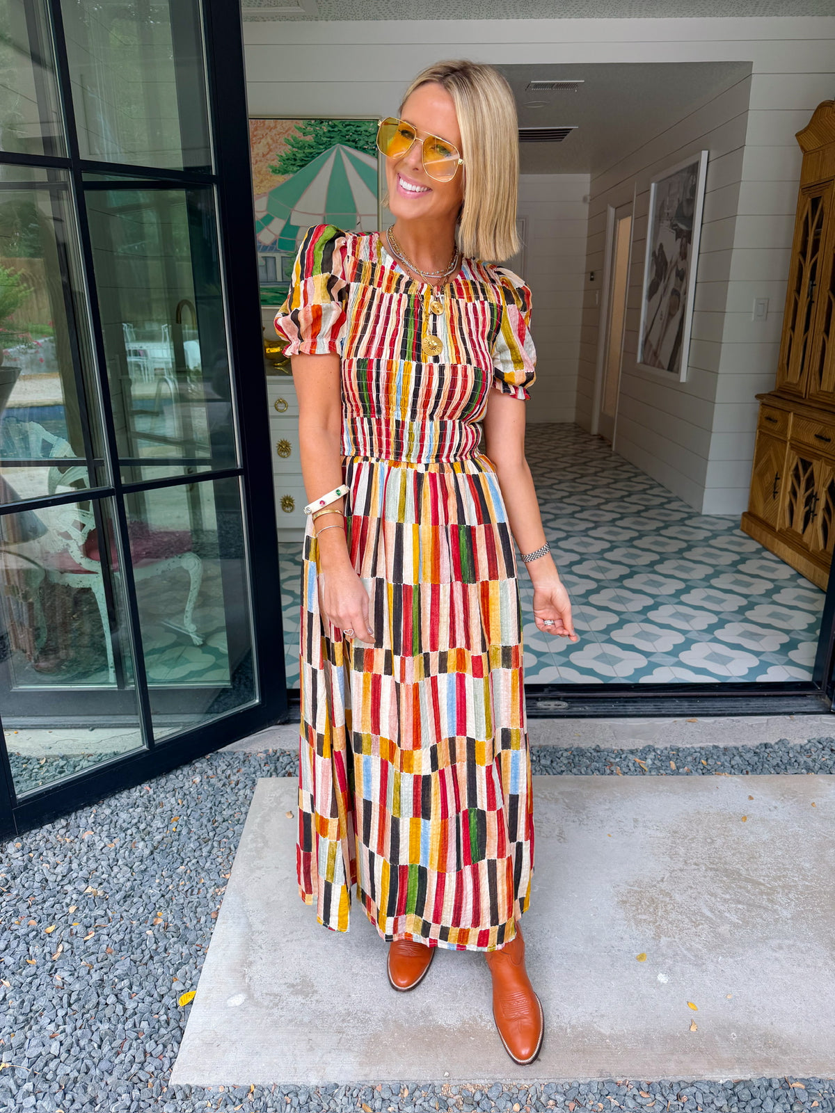 IT FALLS INTO PLACE SMOCKED MIDI DRESS