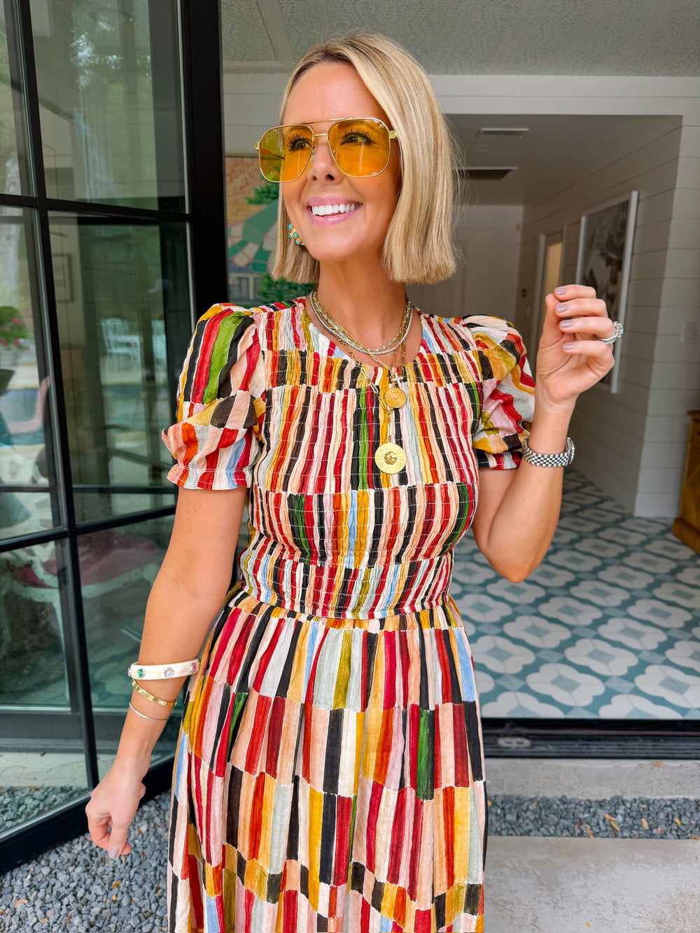 IT FALLS INTO PLACE SMOCKED MIDI DRESS