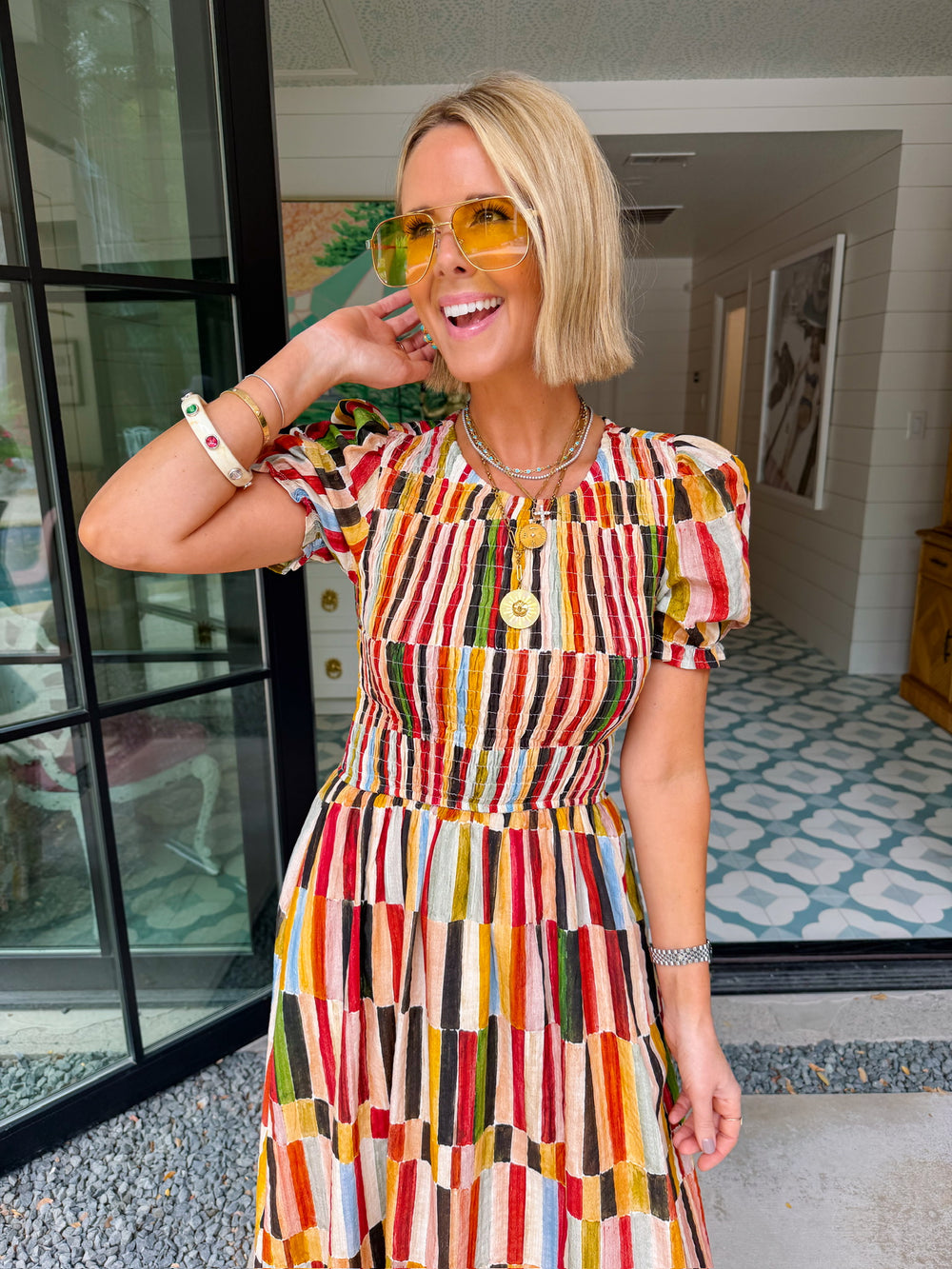 IT FALLS INTO PLACE SMOCKED MIDI DRESS
