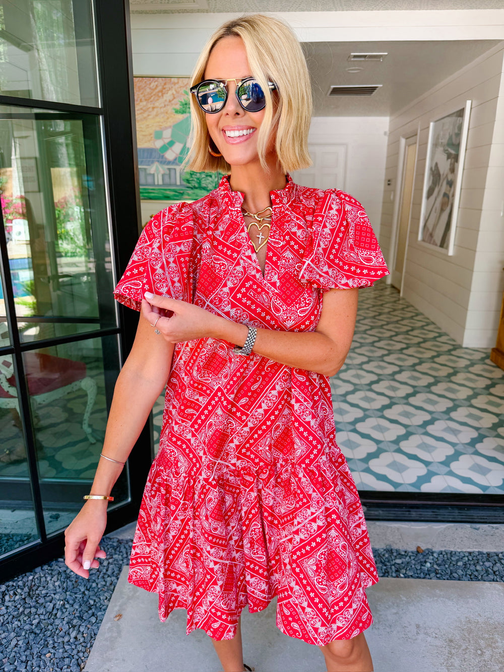 bandana dress red Print Mini Dress symmetrical skirt and pleated frills along the neckline and sleeves add a touch of femininity to an otherwise simple silhouette BRENNA BANDANA V NECK RUFFLE