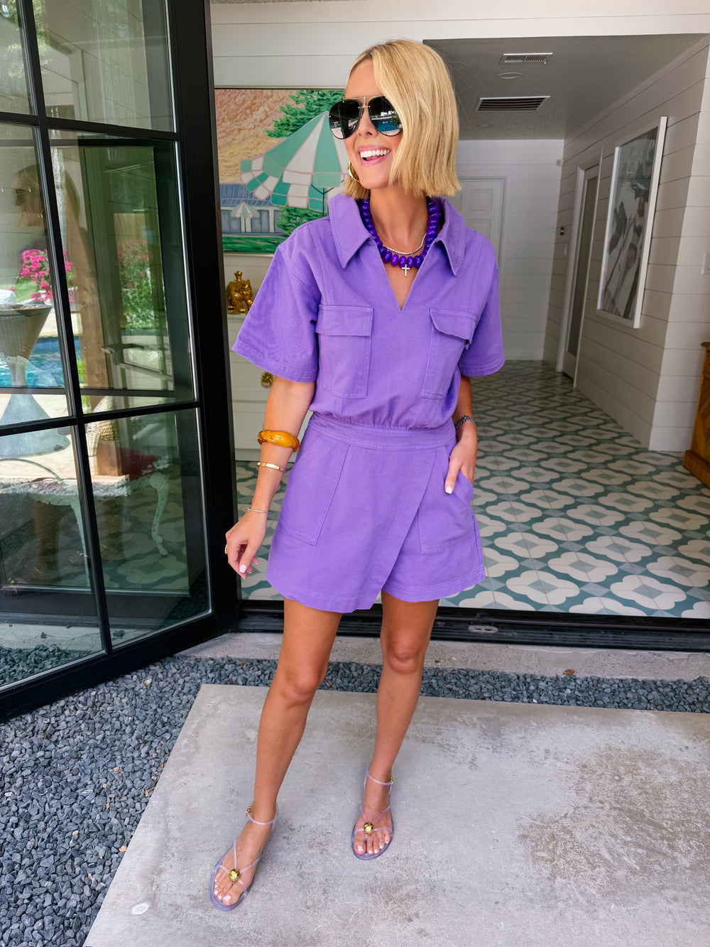 IT DOES IT ALL UTILITY WRAP ROMPER - PURPLE
