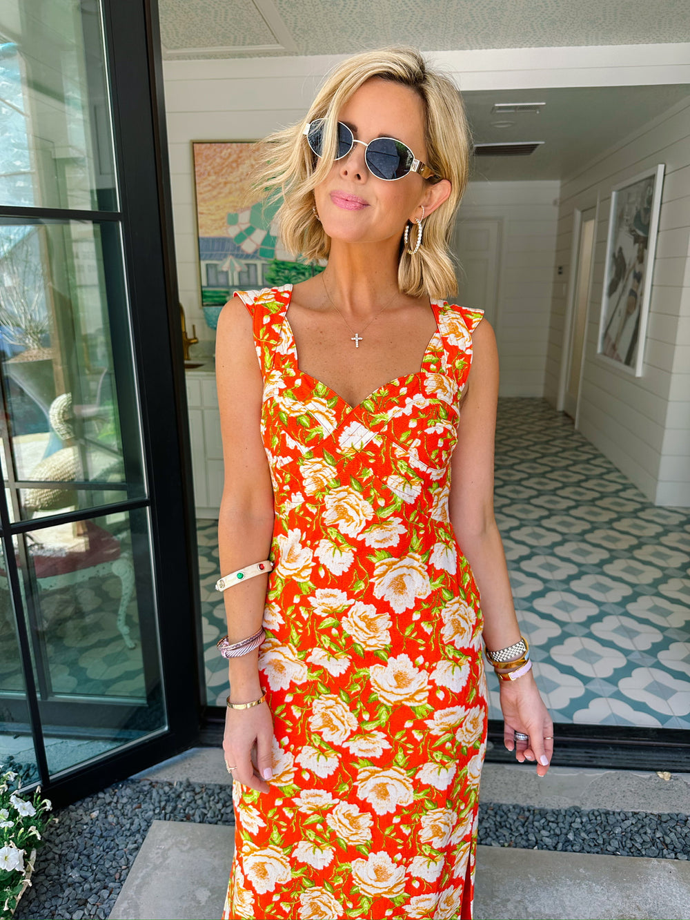 orange floral midi dress The Kathia Smocked in + Pink Small front closure Short sleeves IN THIS MOMENT FLORAL MIDI