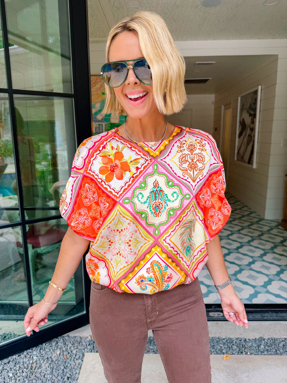 THE BEAUTY BETWEEN FLORAL TILES TOP