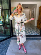 WRAPPED IN FLORALS BUTTON UP BELTED MIDI DRESS