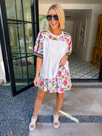Woman wearing sporty, edgy floral skort. Has built in shorts with pockets! Perfect for moms running errands or carpooling. Pair with matching top or any tee.