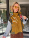 A woman models a color-block utility jacket with denim and green colorblocking. Wear this jacket to round top, a rodeo, or running around town. The best  lightweight, casual fall layer. A must have for busy chic moms on the go.
